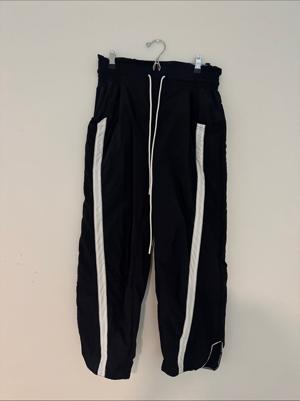 FP Movement ‘Champ is Here’ Black Track Pants with White Side Stripes